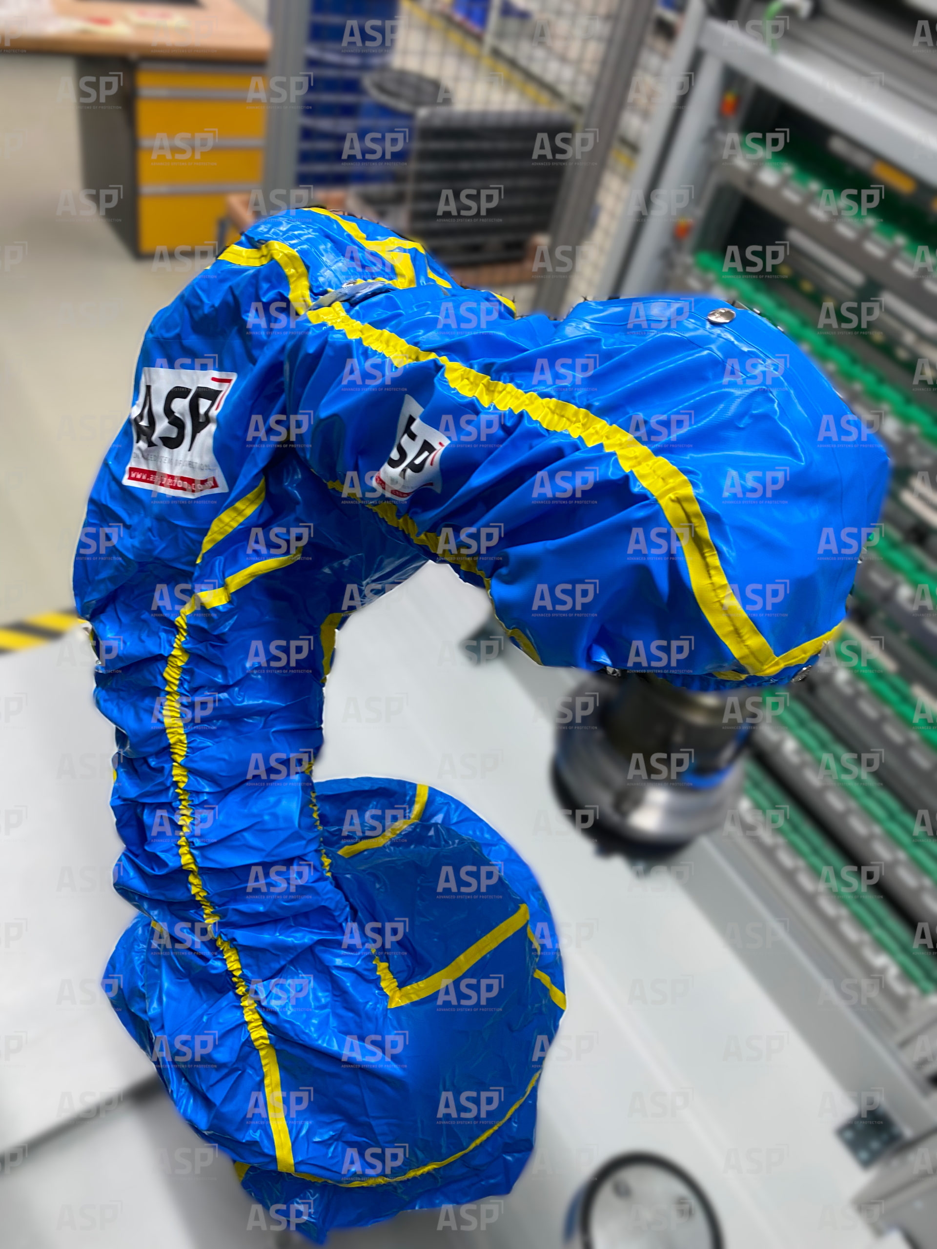 Blue and yellow robot protected against wear and tear, dirt